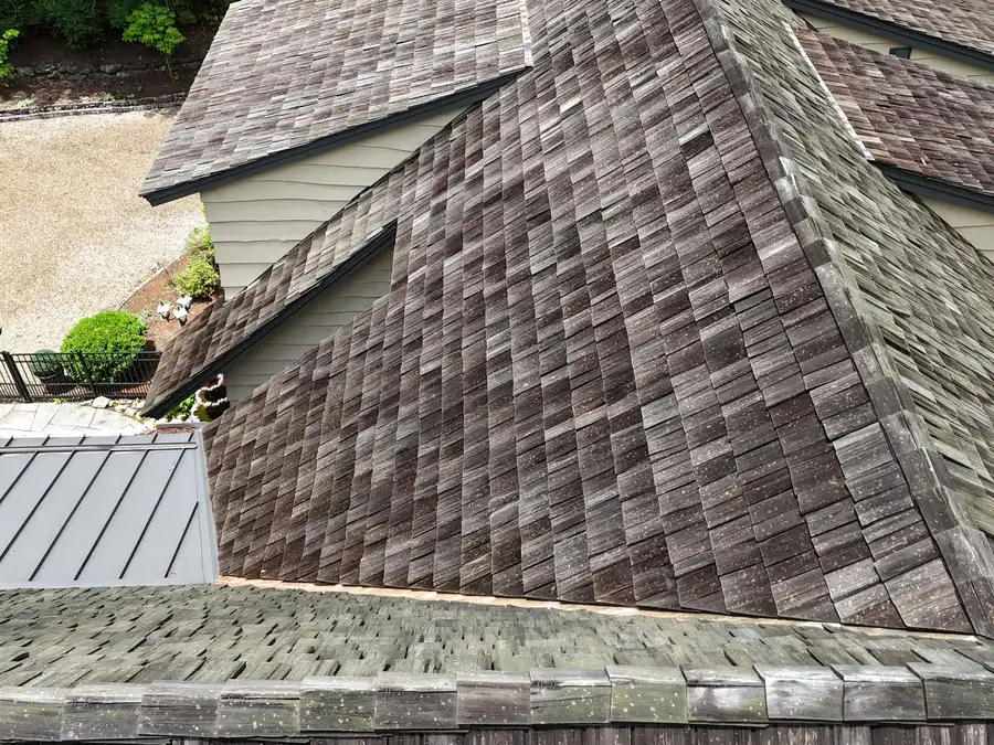 Hail damage across a cedar shake roof in Western North Carolina