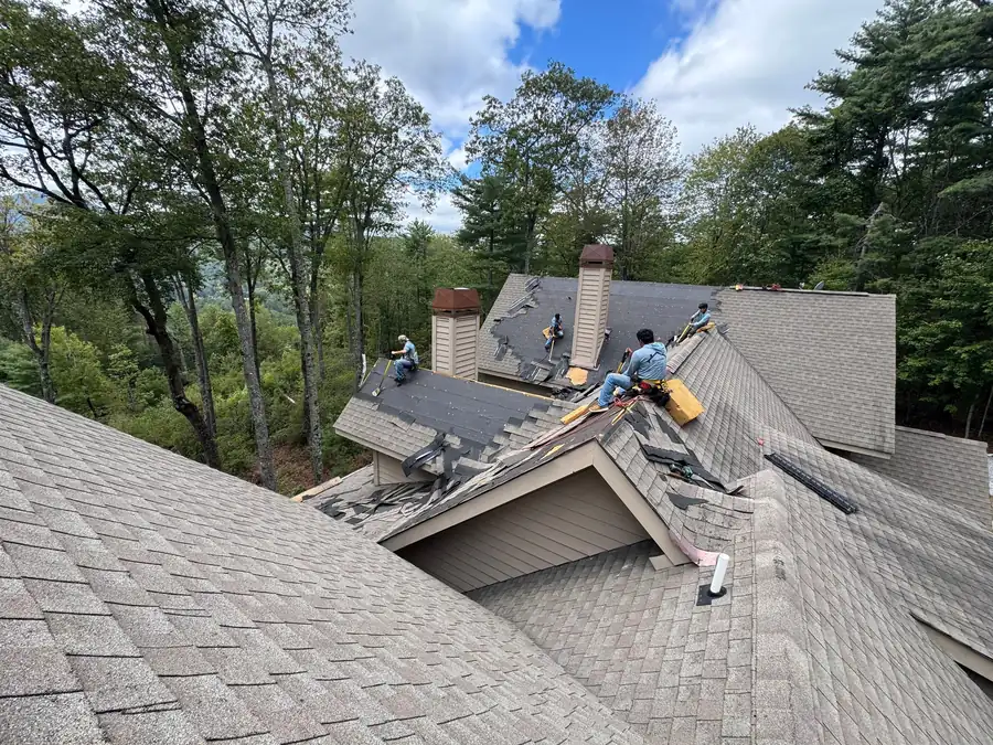 Appalachian Contracting crew mid tear-off on a ridgetop home near Franklin, NC