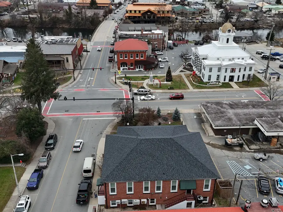 Completed shingle roof on a downtown Franklin, North Carolina building